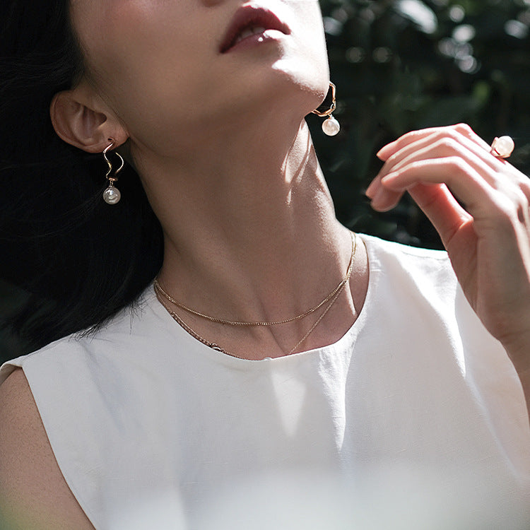 Stylish minimalist geometric pearl earrings