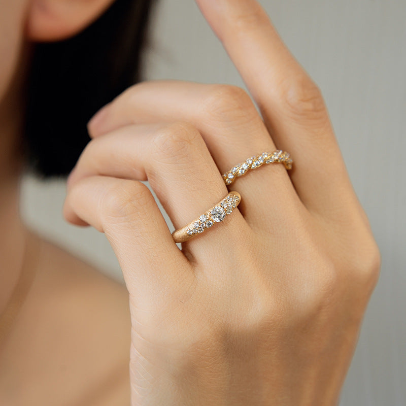 Brushed gold and zirconia ring