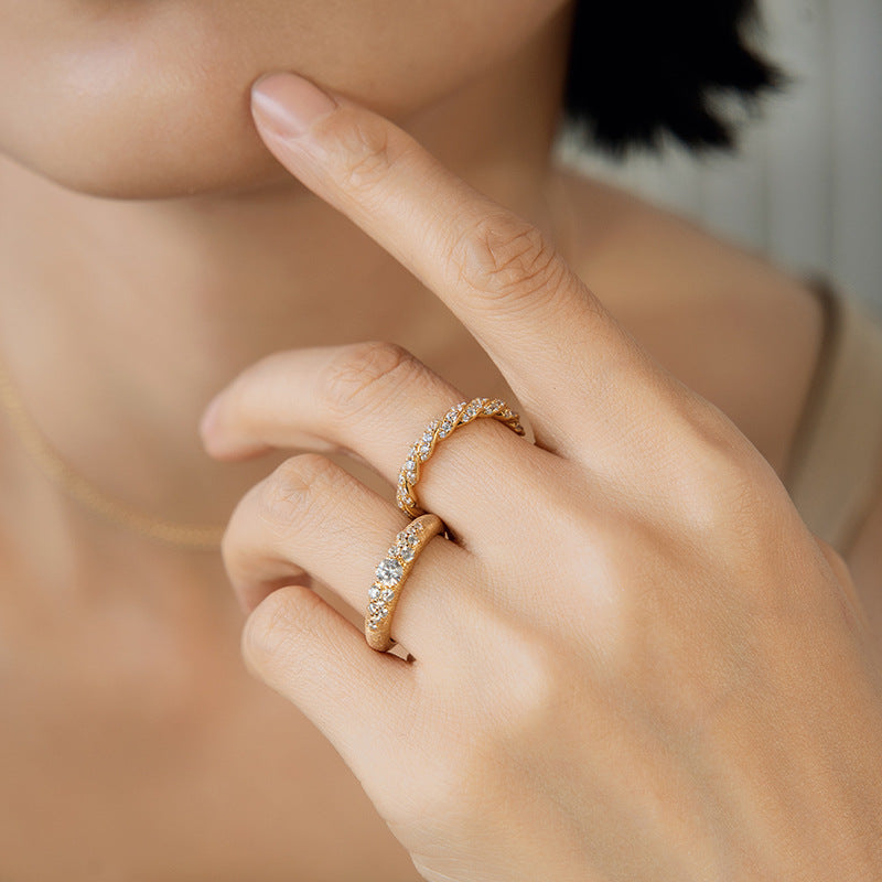 Brushed gold and zirconia ring
