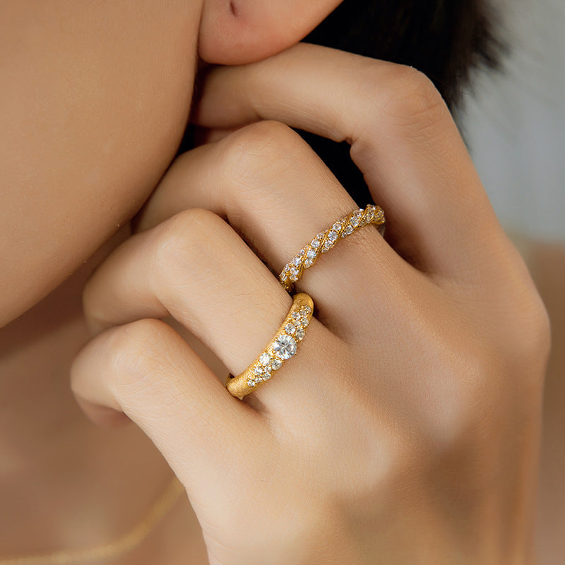Brushed gold and zirconia ring