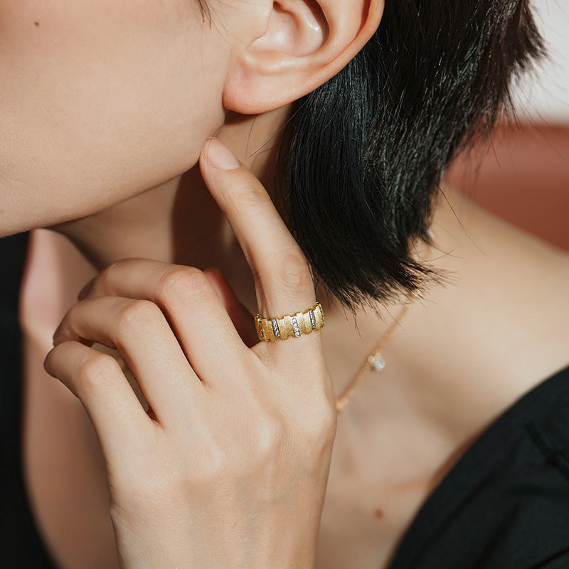 Irregular small gold bar with diamonds and brushed patchwork ring