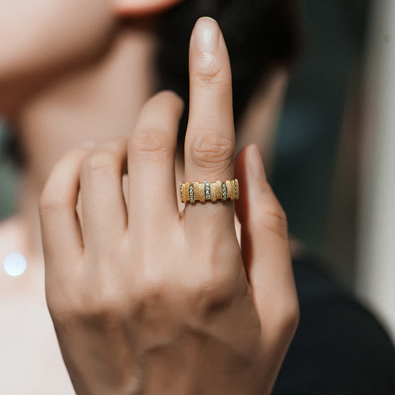 Irregular small gold bar with diamonds and brushed patchwork ring