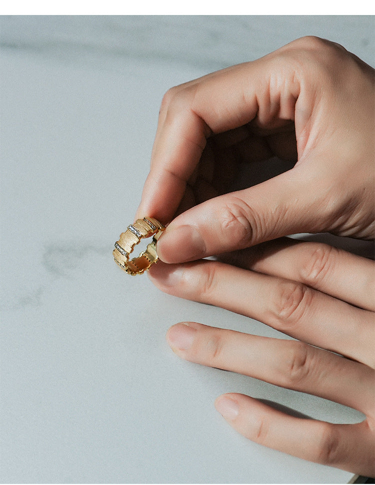 Irregular small gold bar with diamonds and brushed patchwork ring